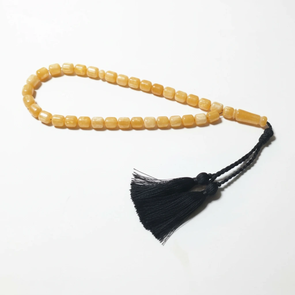 Sebha couleur ambre jaune – Tasbih élégant avec pompon noir
